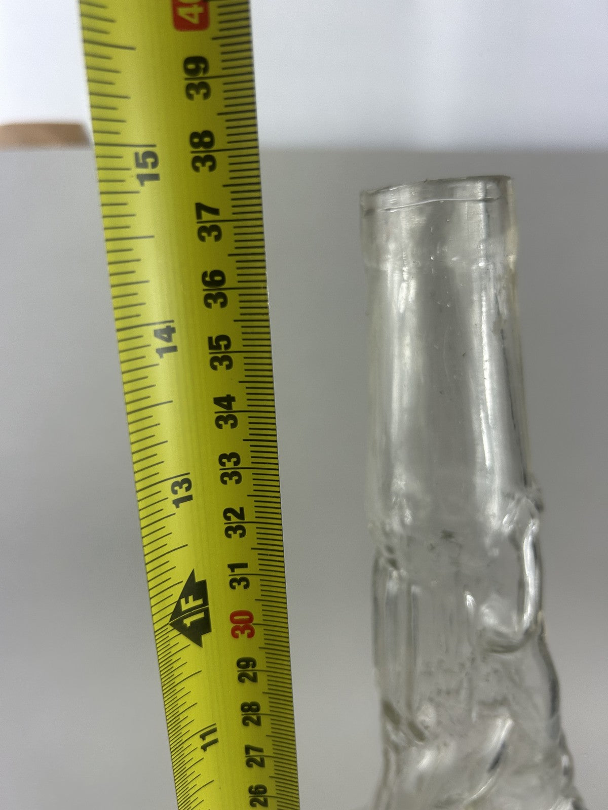 Antique clear glass snake and dolphin liquor bottle, 37cm crafts display