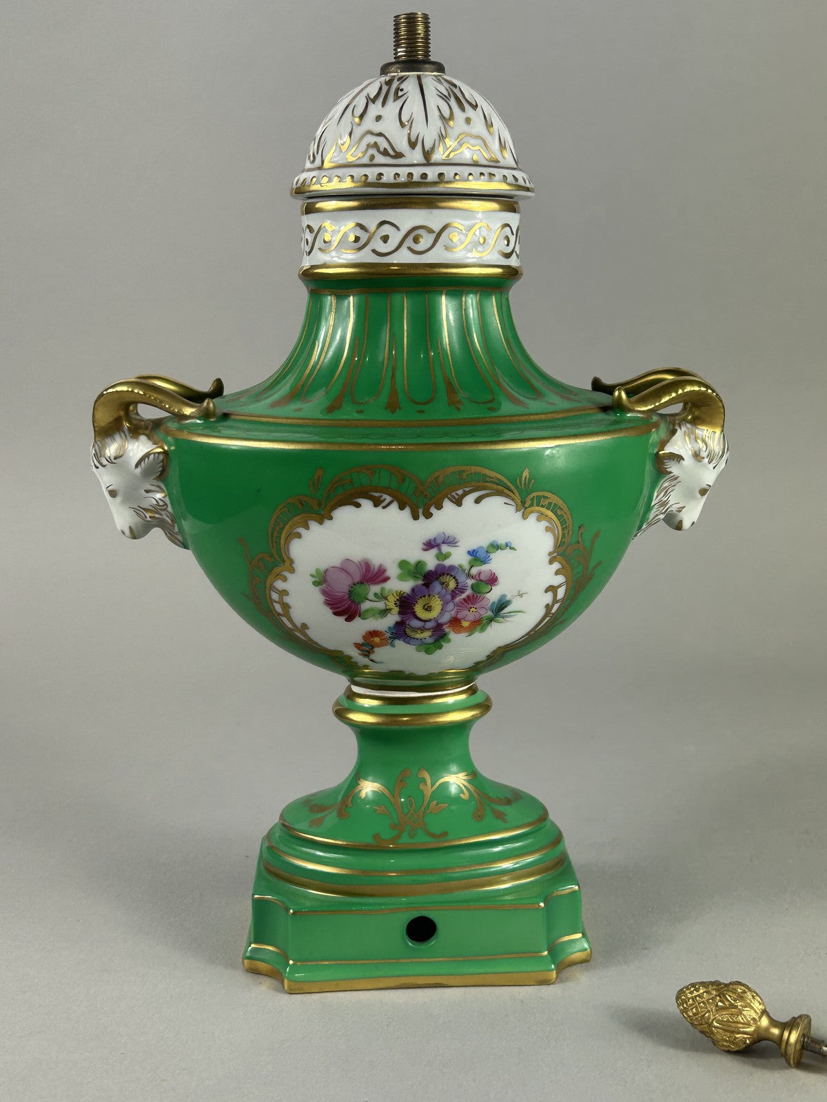 Dresden green porcelain ram’s head lamp base vase with finial