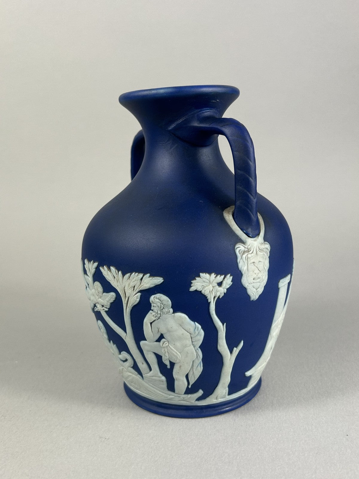 Wedgwood blue jasperware Portland Vase style miniature, 15cm