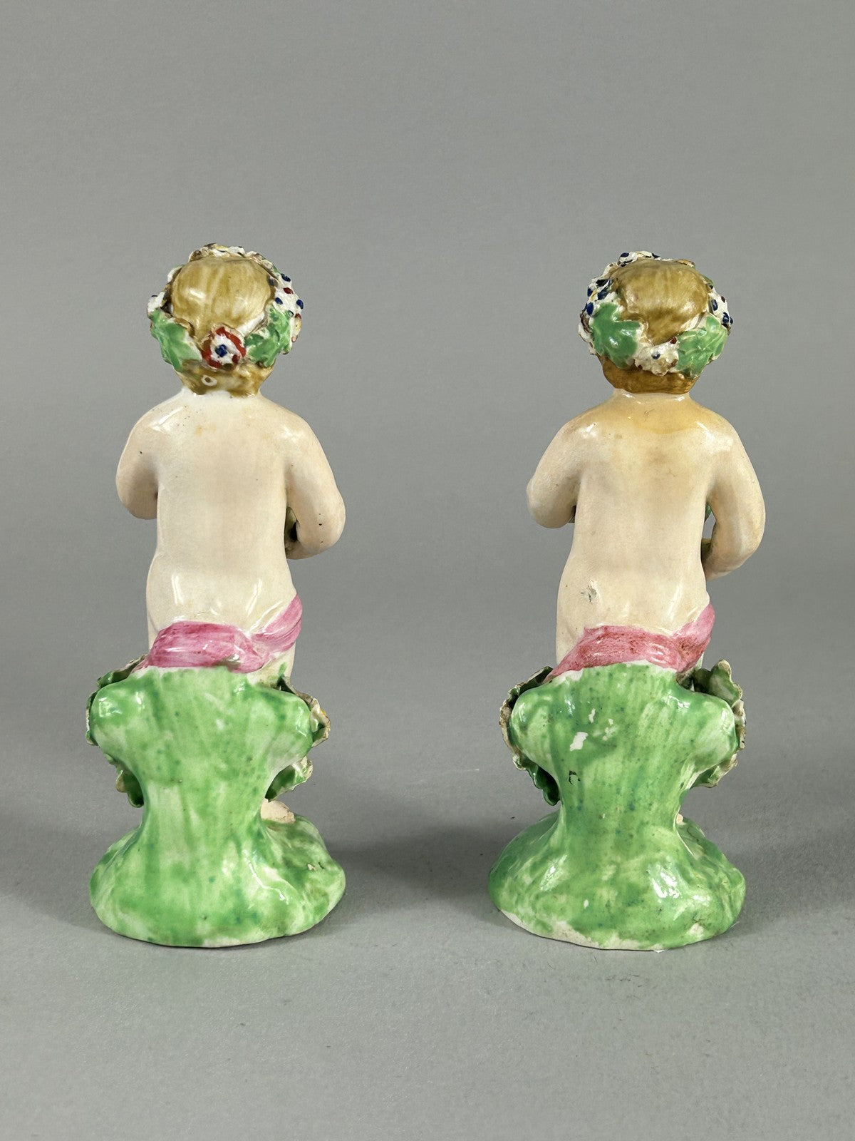 Antique Derby porcelain putti figures with flower baskets c.1780