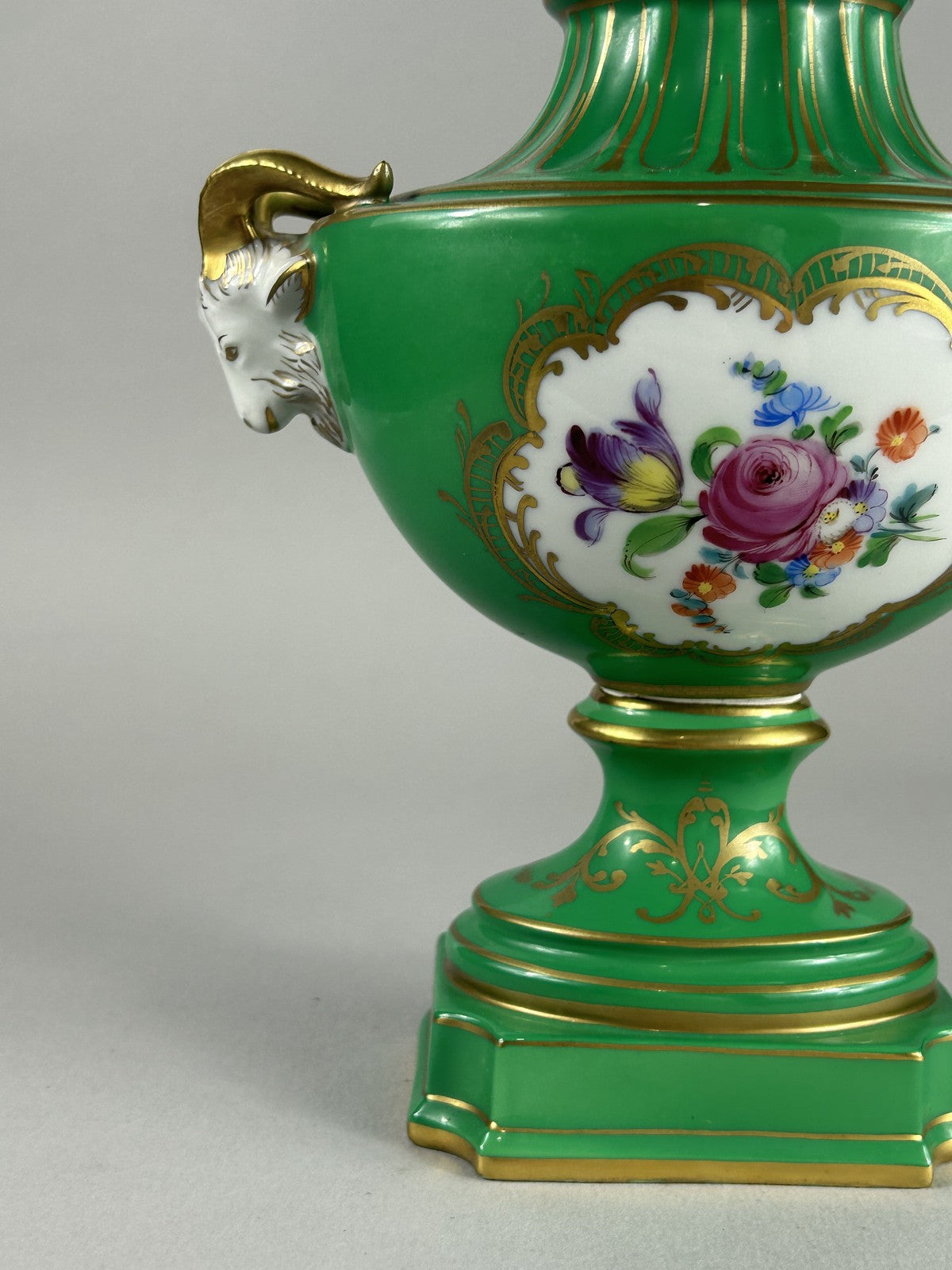 Dresden green porcelain ram’s head lamp base vase with finial