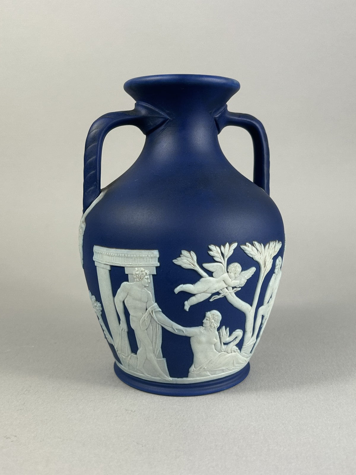 Wedgwood blue jasperware Portland Vase style miniature, 15cm