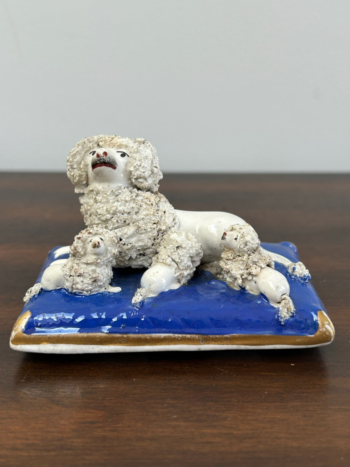 Antique Staffordshire Porcelain Poodle on Cobalt Cushion Crumb Texture0