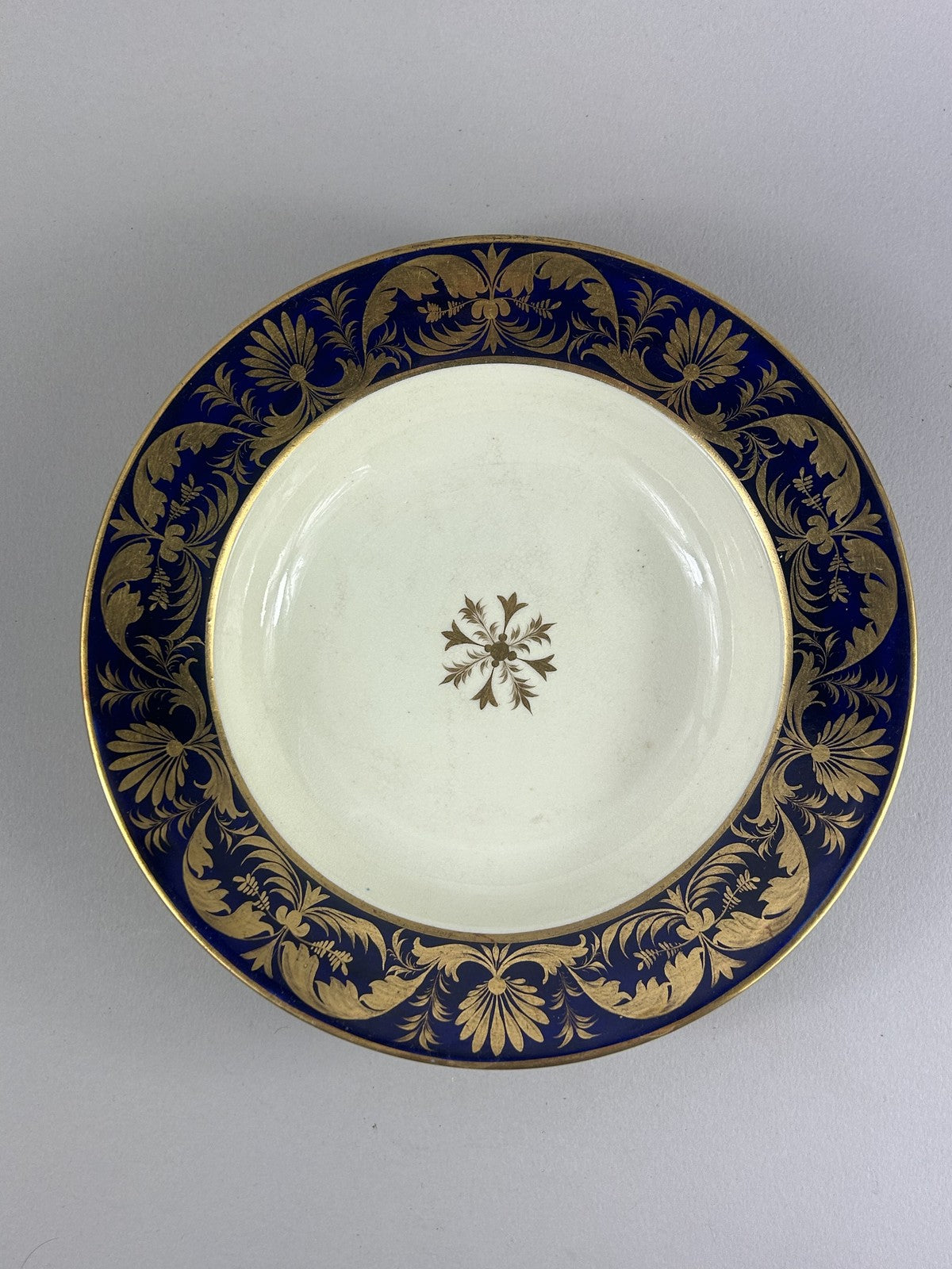 Early Royal Crown Derby cobalt and gilt soup plate c.1810