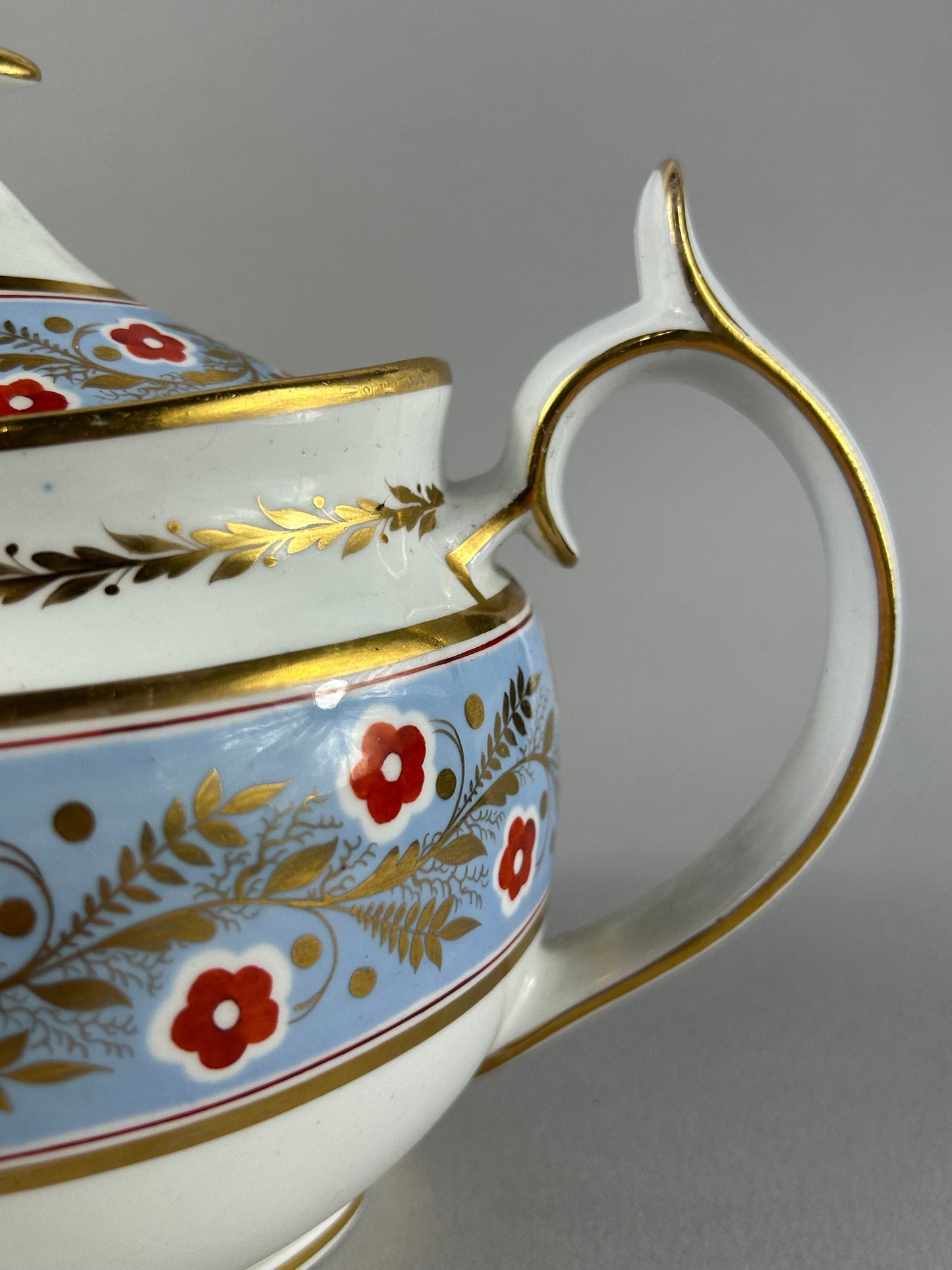 Early 19th Century British Porcelain Teapot with Gilt Floral Border